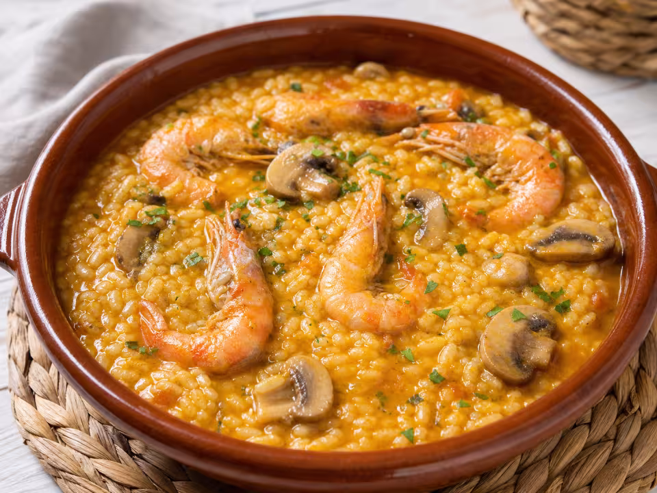 Arroz meloso de langostinos y champi&ntilde;ones